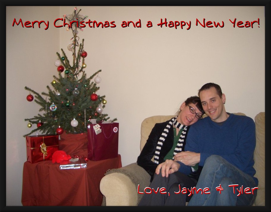 image of Jayme & Tyler next to the tree