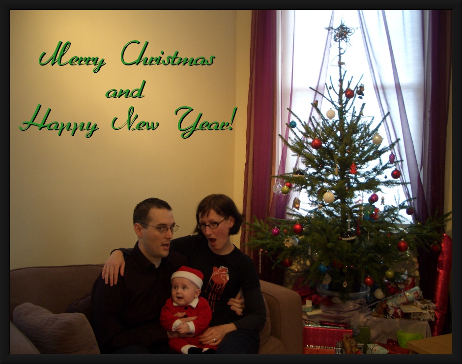 image of Jayme, Tyler, and Pascale next to the tree