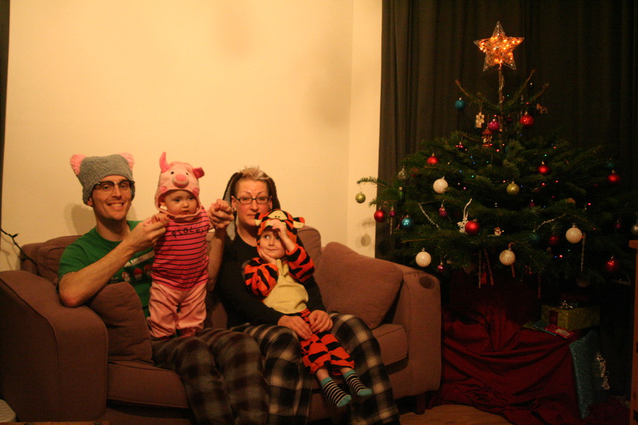 Jamie, Tyler, Pascale, and Frances next to the tree