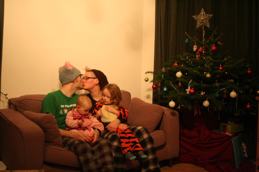 Jamie, Tyler, Pascale, and Frances next to the tree