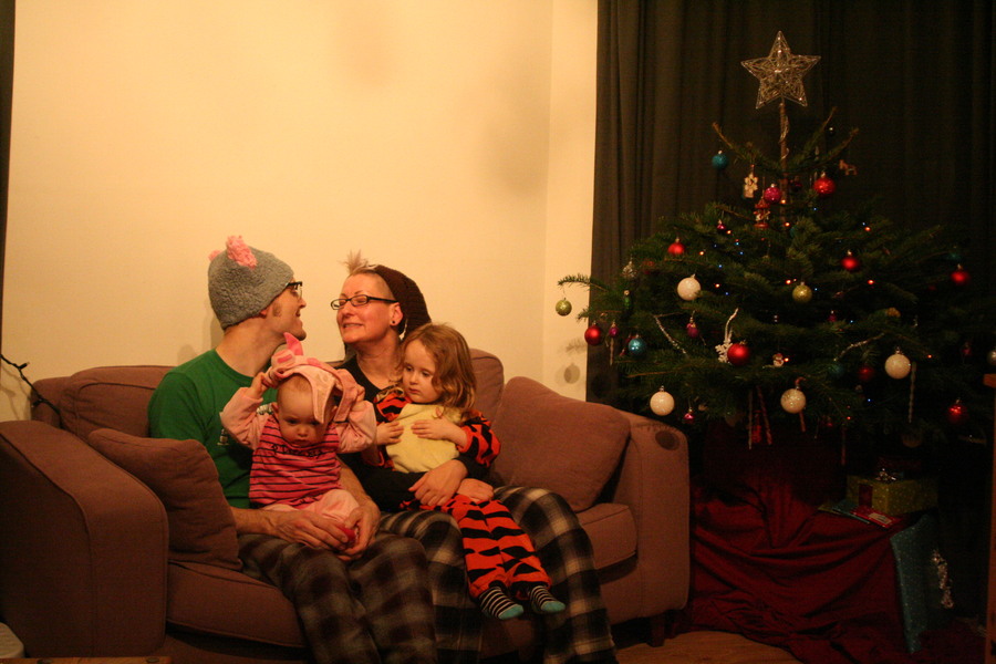 Jamie, Tyler, Pascale, and Frances next to the tree
