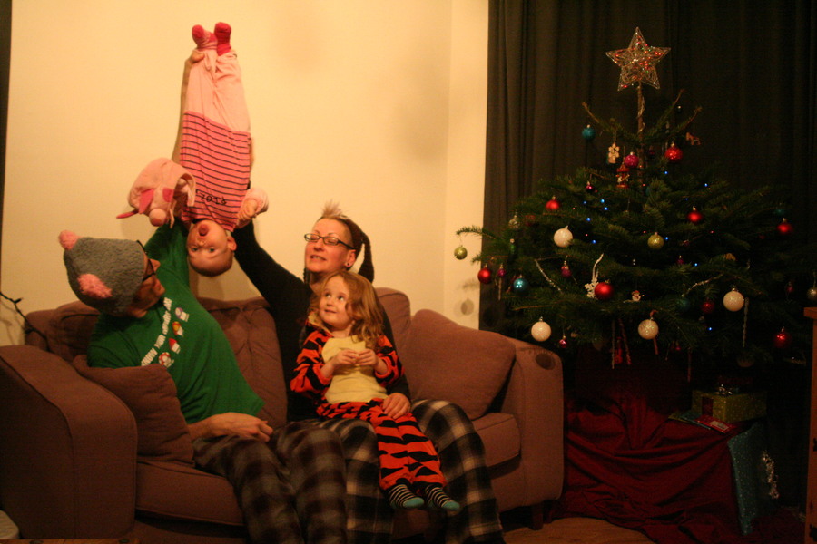 Jamie, Tyler, Pascale, and Frances next to the tree
