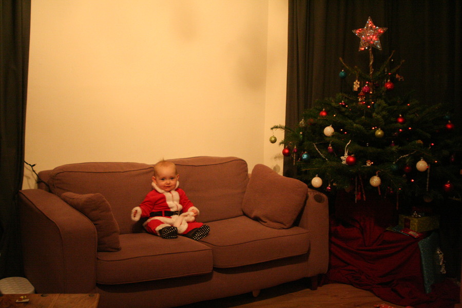 Jamie, Tyler, Pascale, and Frances next to the tree