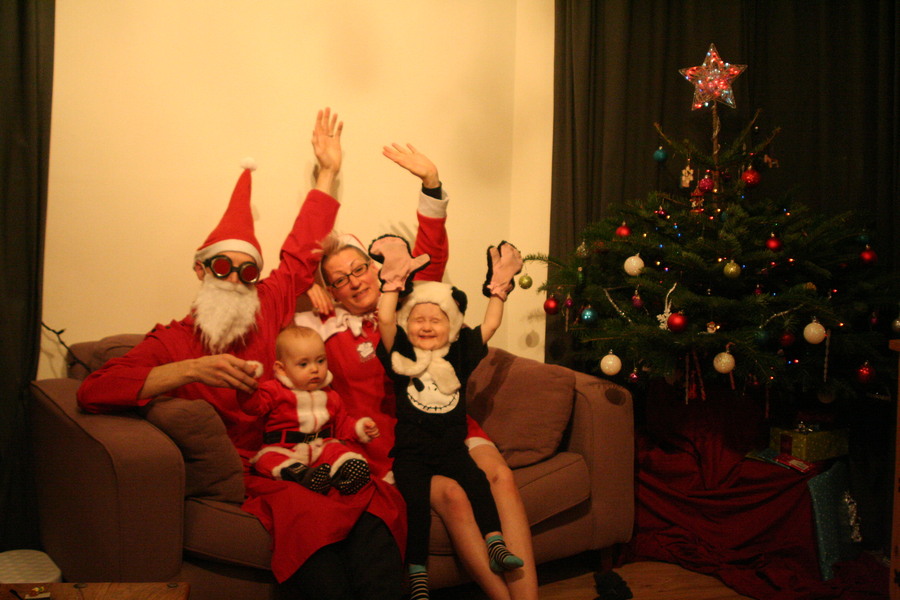 Jamie, Tyler, Pascale, and Frances next to the tree