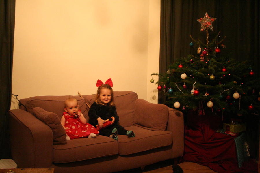 Jamie, Tyler, Pascale, and Frances next to the tree
