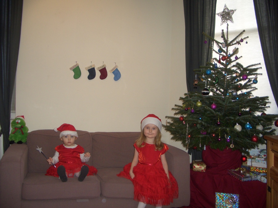 Jamie, Tyler, Pascale, and Frances next to the tree