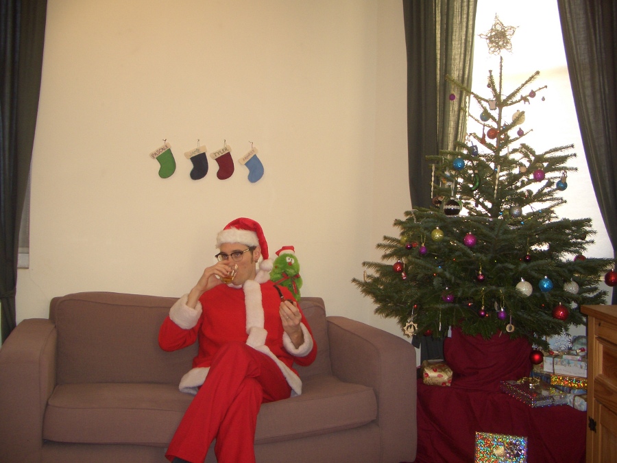 Jamie, Tyler, Pascale, and Frances next to the tree
