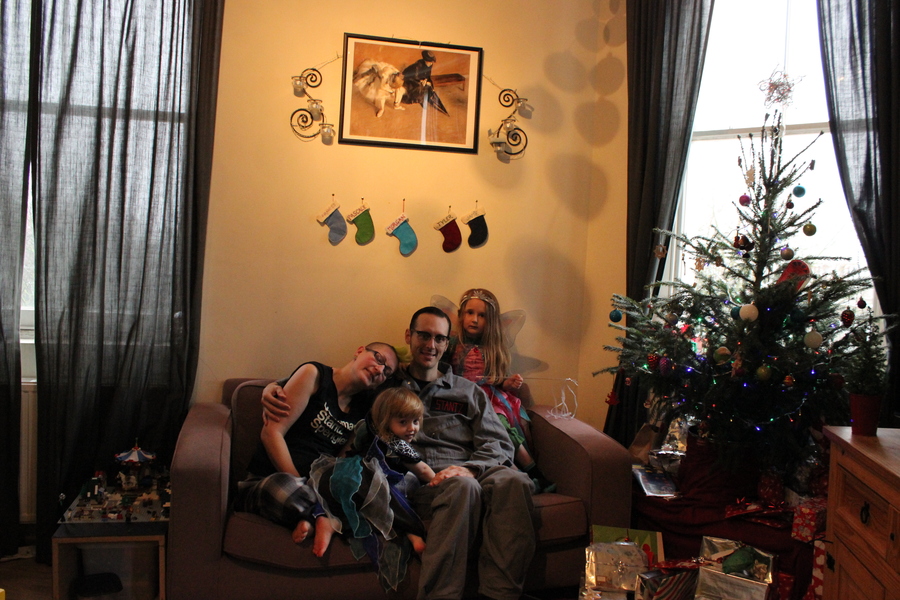 Jamie, Tyler, Pascale, and Frances next to the tree