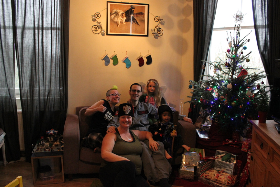 Jamie, Tyler, Pascale, and Frances next to the tree