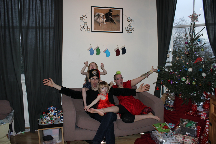 Jamie, Tyler, Pascale, and Frances next to the tree