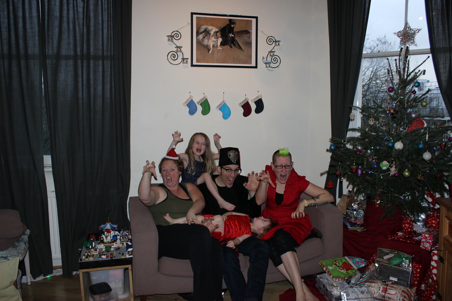 Jamie, Tyler, Pascale, and Frances next to the tree