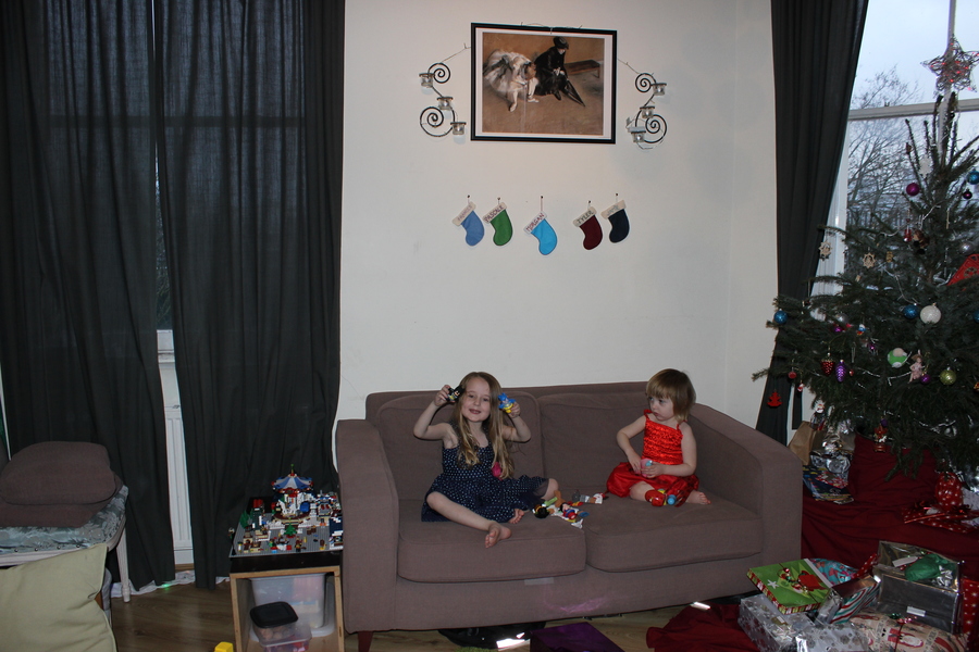 Jamie, Tyler, Pascale, and Frances next to the tree