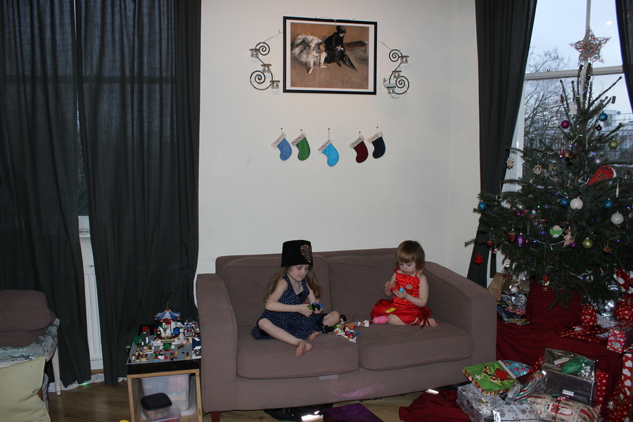 Jamie, Tyler, Pascale, and Frances next to the tree