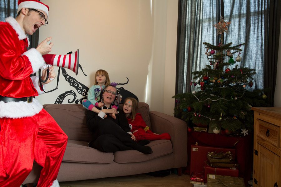 Jamie, Tyler, Pascale, and Frances next to the tree