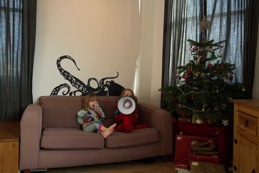 Jamie, Tyler, Pascale, and Frances next to the tree