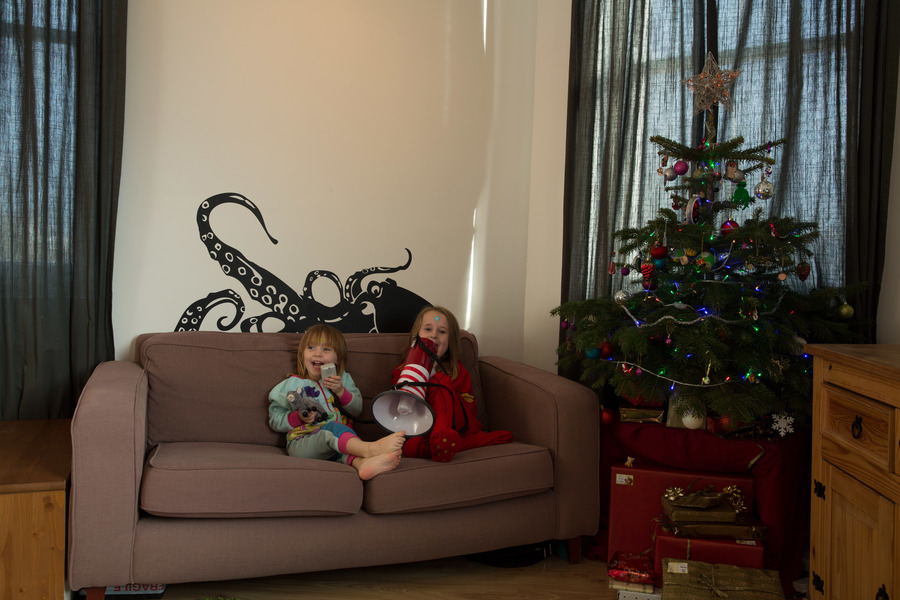 Jamie, Tyler, Pascale, and Frances next to the tree