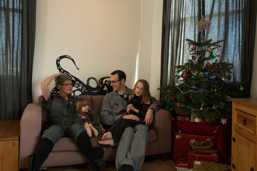 Jamie, Tyler, Pascale, and Frances next to the tree
