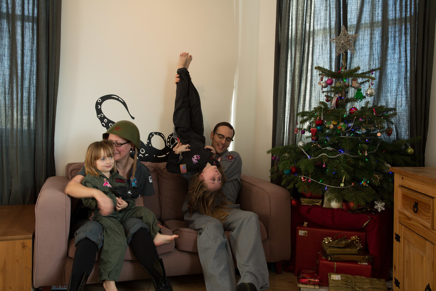 Jamie, Tyler, Pascale, and Frances next to the tree