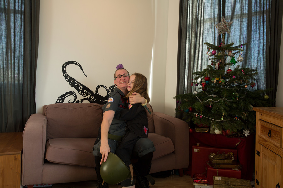 Jamie, Tyler, Pascale, and Frances next to the tree