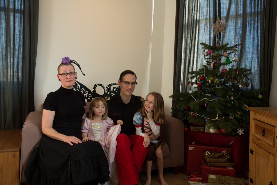 Jamie, Tyler, Pascale, and Frances next to the tree