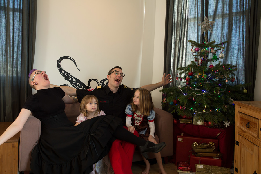 Jamie, Tyler, Pascale, and Frances next to the tree