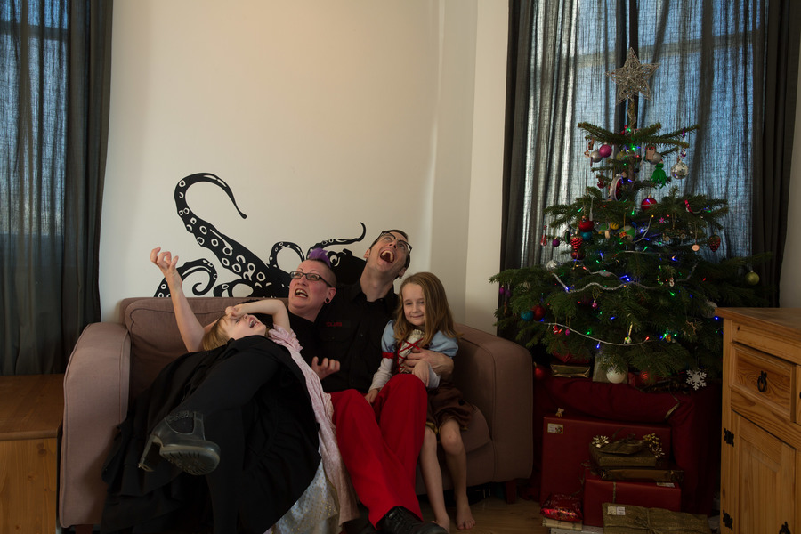 Jamie, Tyler, Pascale, and Frances next to the tree