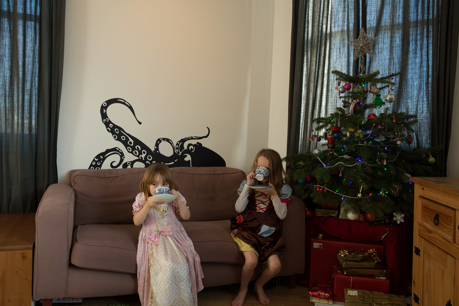 Jamie, Tyler, Pascale, and Frances next to the tree