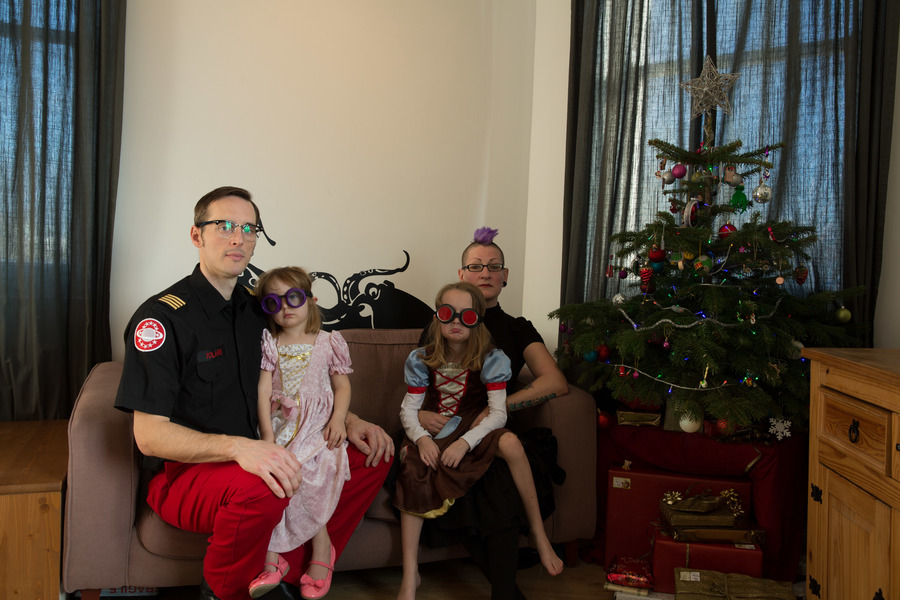 Jamie, Tyler, Pascale, and Frances next to the tree